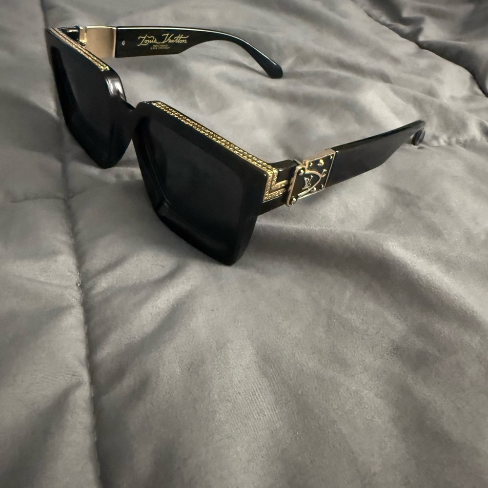 Black Sunglasses with Gold Accents
